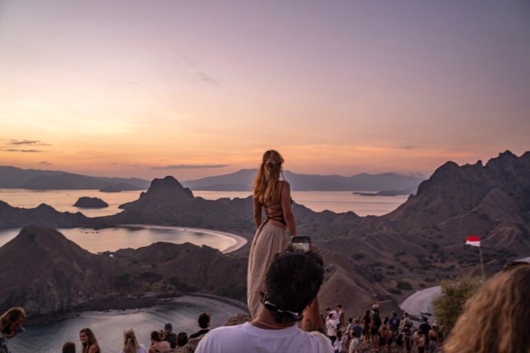 padar island komodo national park, padar island summit hike, padar island viewpoint, iconic padar island landscape, padar island trekking guide, padar island travel tips, multi colored beaches padar island, island hopping padar island, pink beach near padar island, best view in komodo national park, komodo national park tourism statistics, komodo island visitor numbers 2026, indonesia tourism growth komodo, komodo dragons in the wild, see komodo dragon habitat, snorkeling and diving komodo islands, sustainable tourism komodo national park, eco tourism east nusa tenggara